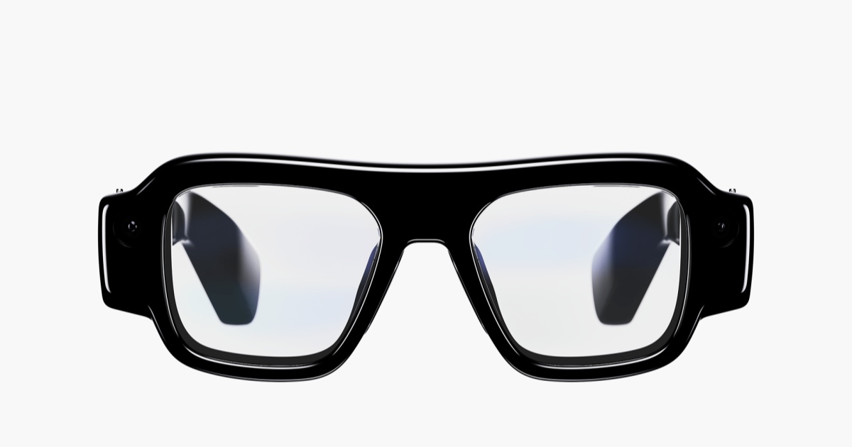 Kacamata augmented reality Snap Specs dengan desain bingkai lebar dan lensa transparan
