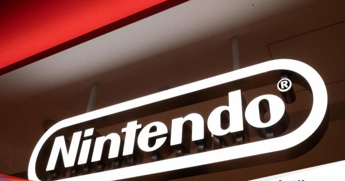 Ilustrasi logo Nintendo dengan latar belakang gelap dan efek cahaya merah sebagai simbol peretasan